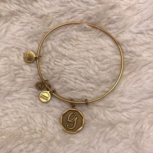 Gold Alex and Ani “G” bracelet